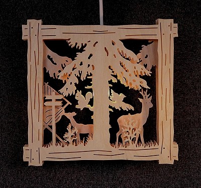 beleuchtetes Fensterbild - Motiv "Rehe mit Futterkrippe"